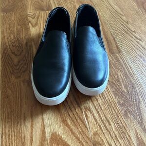 Cole Haan Black Flats & Loafers with Slip-On Design and Smooth Leather Finish